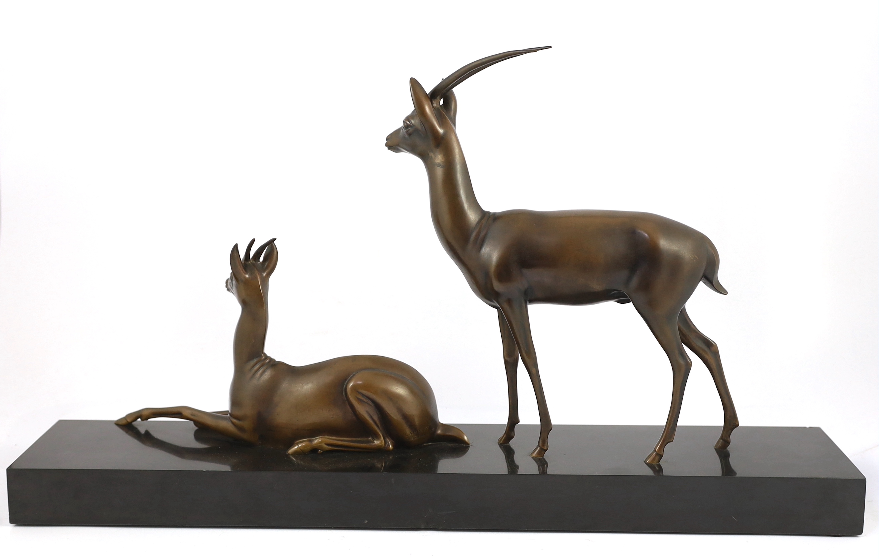 Georgij Dmitrievic Lavroff (Russian, 1895-1991). An Art Deco bronze group of two antelope, 73cm wide, 14cm deep, 42cm high